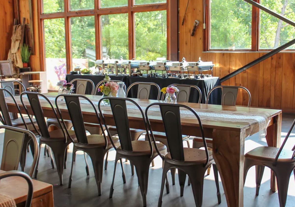 Table seating and catering setup for a private party at Cadence Clubhouse by Andora Restaurant event venue.